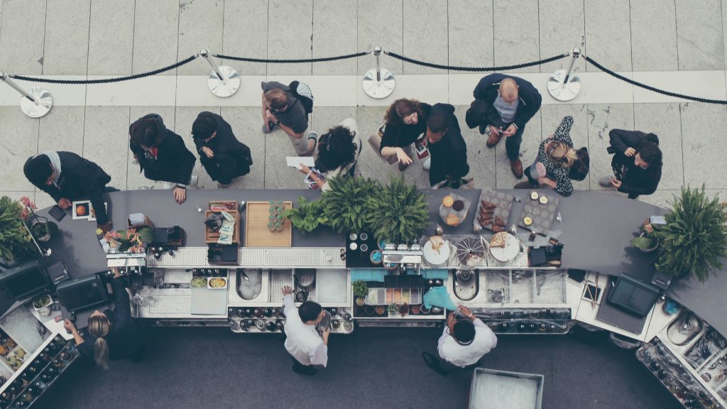 People waiting to order at restaurant