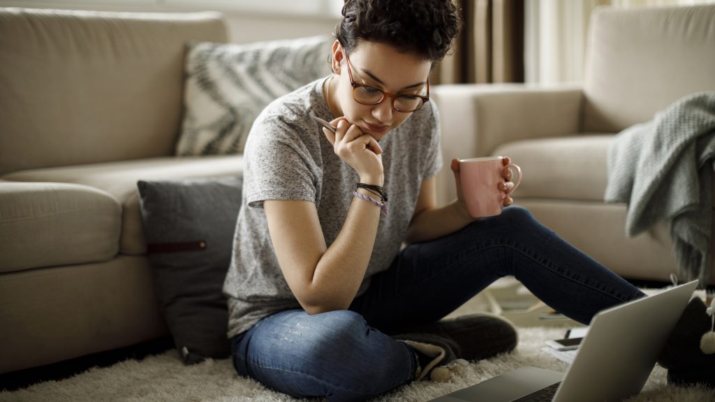 Young woman working at home