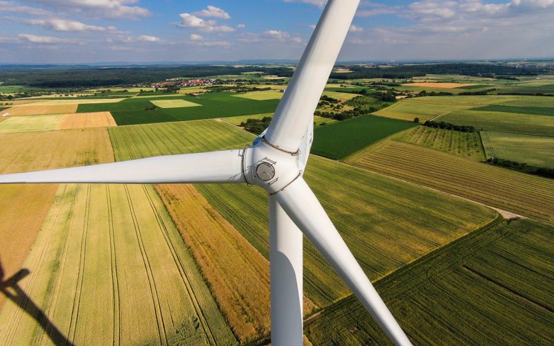 Wind turbine in farm field